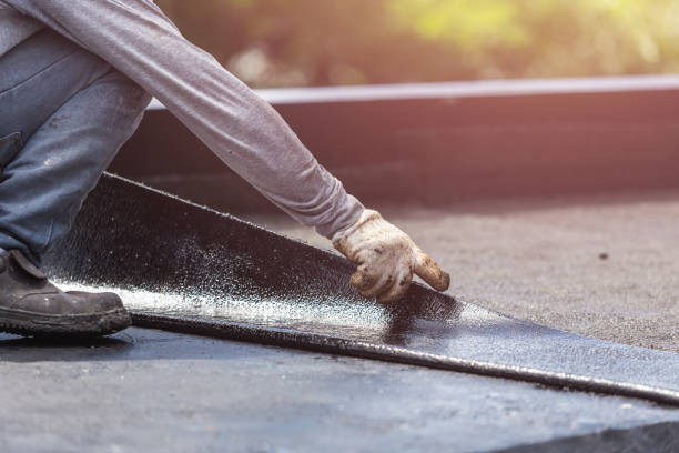 Professional Basement Waterproofing technician working in Owensville, IN